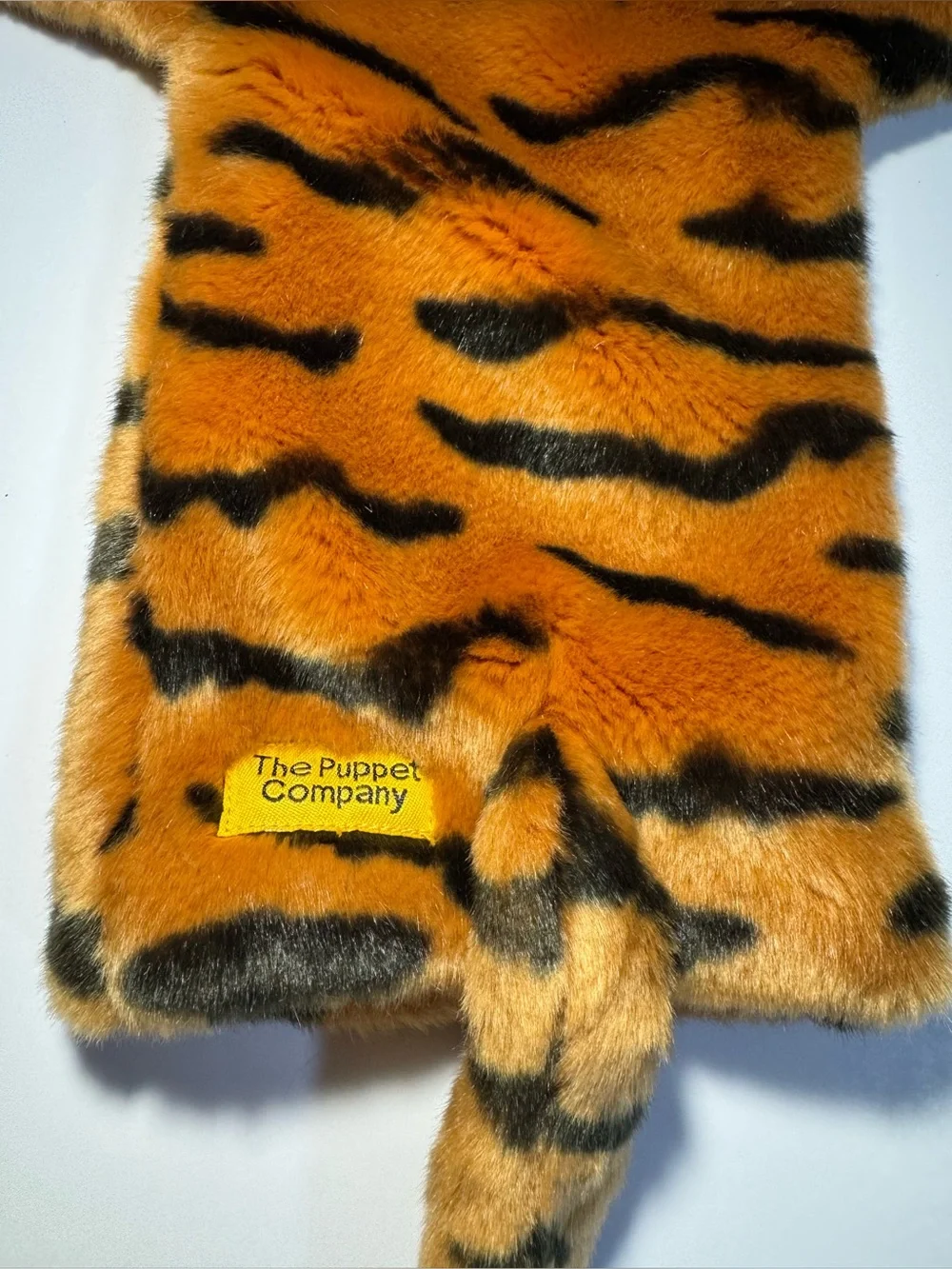 The Puppet Company Long Sleeve Tiger Puppet 15” orange and black.